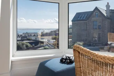 a large window with a view of the ocean at 3 Porthminster B&B in St Ives