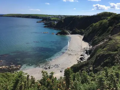 a view of the beach from the cliffs at Linton Luxury Holiday Home in Mevagissey