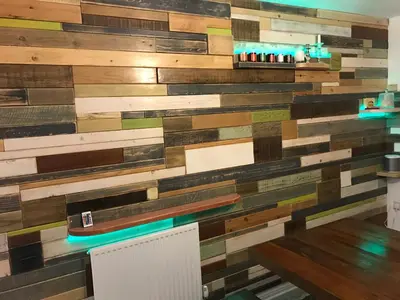 a wall made out of reclaimed wood at Luxurious House in Cornwall in Truro