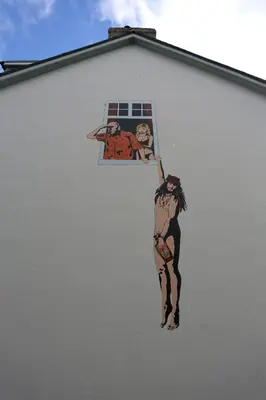 a painting of a man on the side of a building at Bedlam House in Newquay