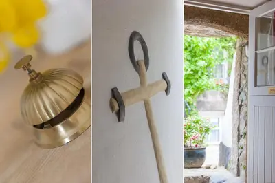a door handle and a bell on a door at Anchorage Guest House, St Ives in St Ives