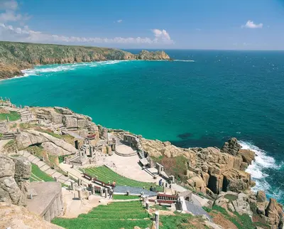 a view of the ocean from the top of a cliff at Tehidy Holiday Park in Illogan