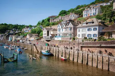 a group of boats in the water in a town at Portbyhan Hotel in Looe