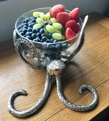 a bowl of fruit in the shape of a snake at Wellingtons in Fowey