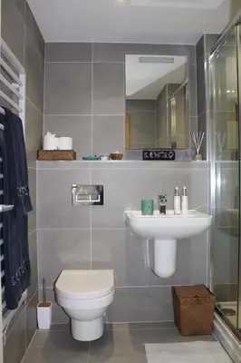 a bathroom with a toilet and a sink at Endcliffe in Falmouth