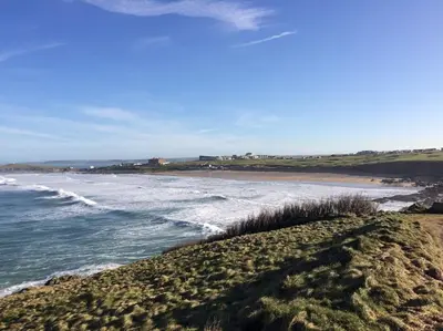 a view of the beach from the shoreline at 34 Surfview Beach House in Newquay