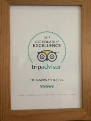 a picture of a sign in a frame at Deganwy Hotel in Looe