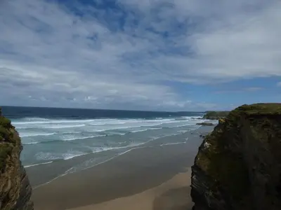 a view of the ocean from a rocky beach at Spindrift in Newquay