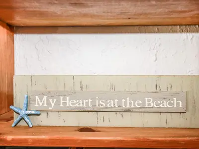 a sign that says my heart is at the beach at Stable Cottage in Newquay