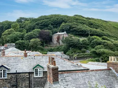 a view from the roofs of houses in a village at Cobble Cottage in Boscastle