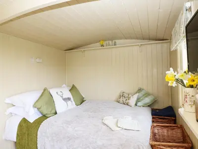 a small room with a bed in a house at Bramble in Wadebridge