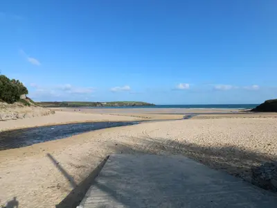 a crack in the sand on a beach at Rockpool in Padstow