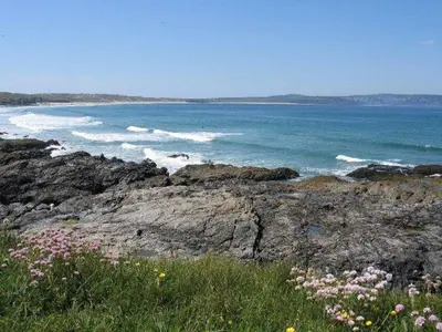 a view of the ocean from a rocky beach at Godrevy Cottage in Hayle