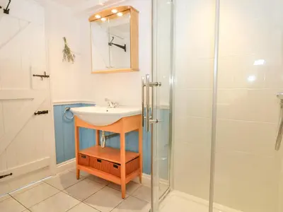 a bathroom with a sink and a shower at Trehan in St Ives