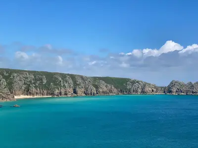 an aerial view of a large body of water with cliffs at Tresowes Green Cottage in Helston