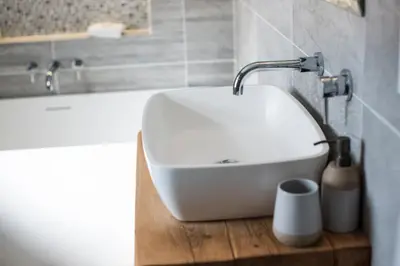 a bathroom with a sink and a bath tub at chyreen@marazion in Marazion
