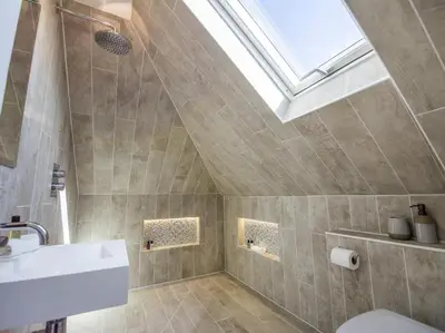 a bathroom with a sink and a skylight at chyreen@marazion in Marazion