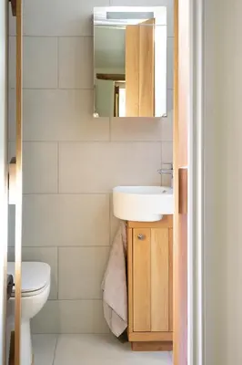 a small bathroom with a sink and a mirror at St Kew Escapes Nr Port Isaac in Saint Kew