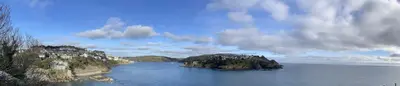 an island in the middle of a body of water at Fowey River Views in Fowey