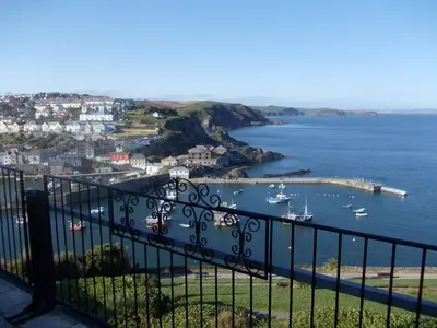 a view of a harbor with boats in the water at Honeycombe House in Mevagissey