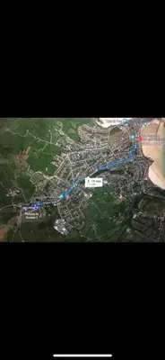 a map of a city with a blue trail at The Lighthouse Penthouse, Studio and Holiday Home in St Ives