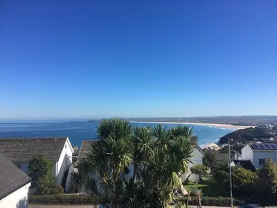 a view of the ocean from a house at Coast Accommodation in St Ives