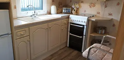 a kitchen with a sink and a stove at C28 Angels retreat in Par