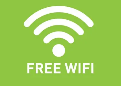 an image of a wifi symbol with the text free wifi at Porthpean Apartment in Charlestown
