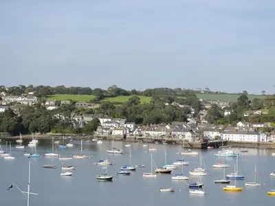 a bunch of boats are docked in a harbor at Willow - 31287 in Porthtowan