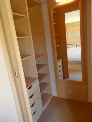 a closet with shelves and a mirror in a room at Peace and quiet in countryside location near Perranporth in Perranzabuloe
