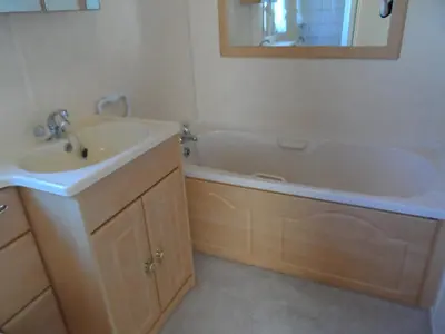 a bathroom with a sink and a bath tub at Luxury Mobile Home near Perranporth situated on a quiet farm in Truro