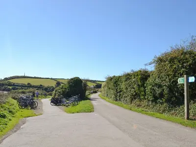 a group of bikes parked on the side of a road at Little Tregarthen in Padstow