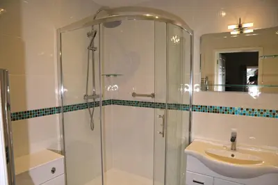 a bathroom with a shower and a sink at Westberry Hotel in Bodmin