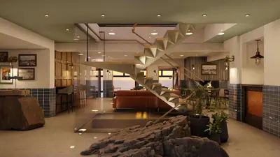 a lobby with a staircase in a building at Pedn-Olva in St Ives