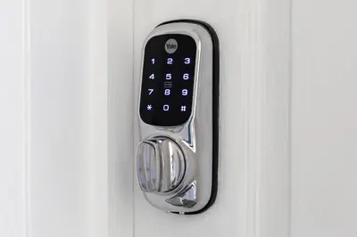 a door handle with a remote control on it at Oasis House in Falmouth