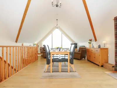 a dining room with a table and chairs at Treview in Launceston