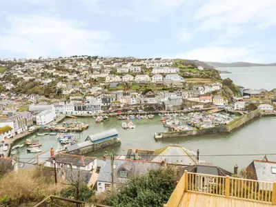 a view of a harbor with boats in the water at Pink House in Mevagissey