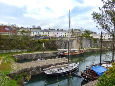 a couple of boats docked in a harbor at Tyack in Charlestown