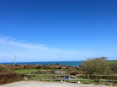 a view of the ocean from the top of a hill at Atlantic View in Tintagel