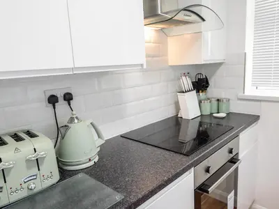 a kitchen with a counter top with a appliance on it at Little Retreat in Liskeard