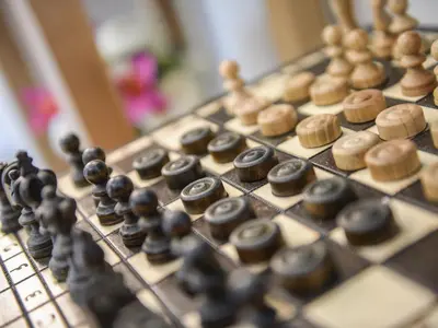 a close up of a chess board with donuts on it at Little Retreat in Liskeard