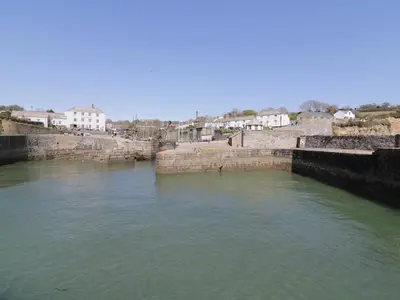 a view of a river with buildings in the background at Oh Buoy! in Charlestown