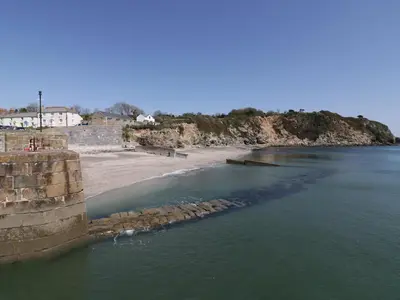 a view of a beach next to the ocean at Oh Buoy! in Charlestown