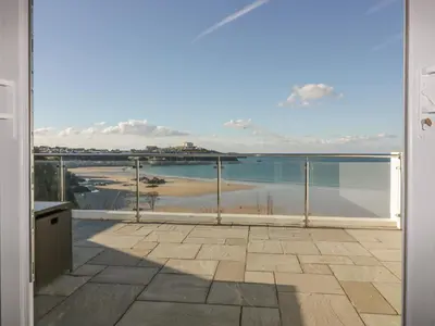 a view of the ocean from a balcony at Buena Vista in Newquay
