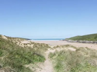 a path through the sand dunes at the beach at The Beach House in Crantock