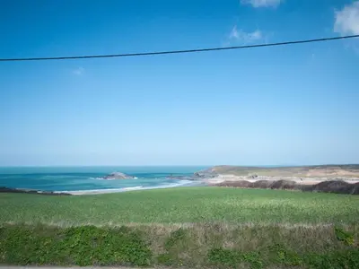 a view of the ocean from the top of a hill at Bay View House in Crantock