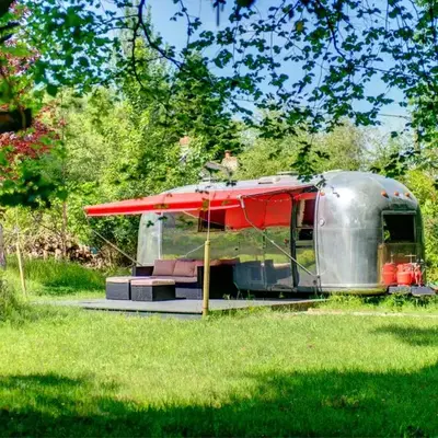 Vintage glamping Airstream with Farm Animals