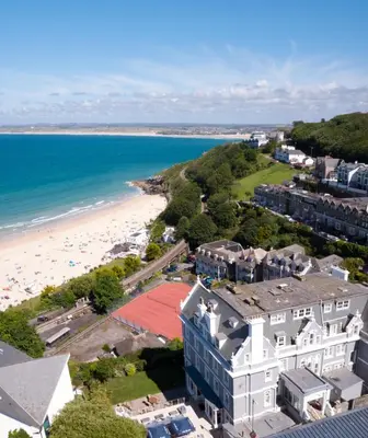 an aerial view of the beach and buildings at Harbour Hotel & Spa St Ives in St Ives
