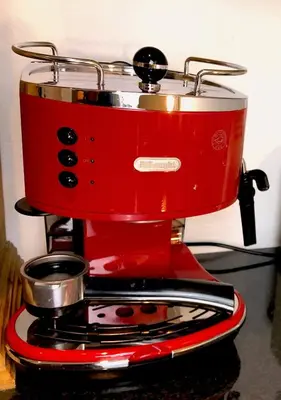 a red blender with a pot on top of it at Central Boscastle studio flat in Boscastle