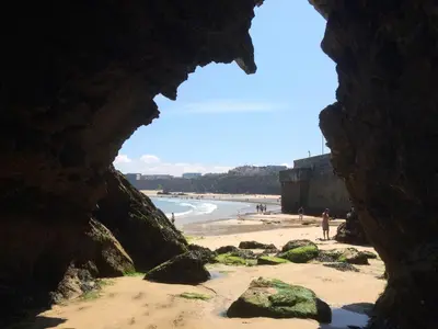 a view of a beach from a cave at Palace Guesthouse in Newquay